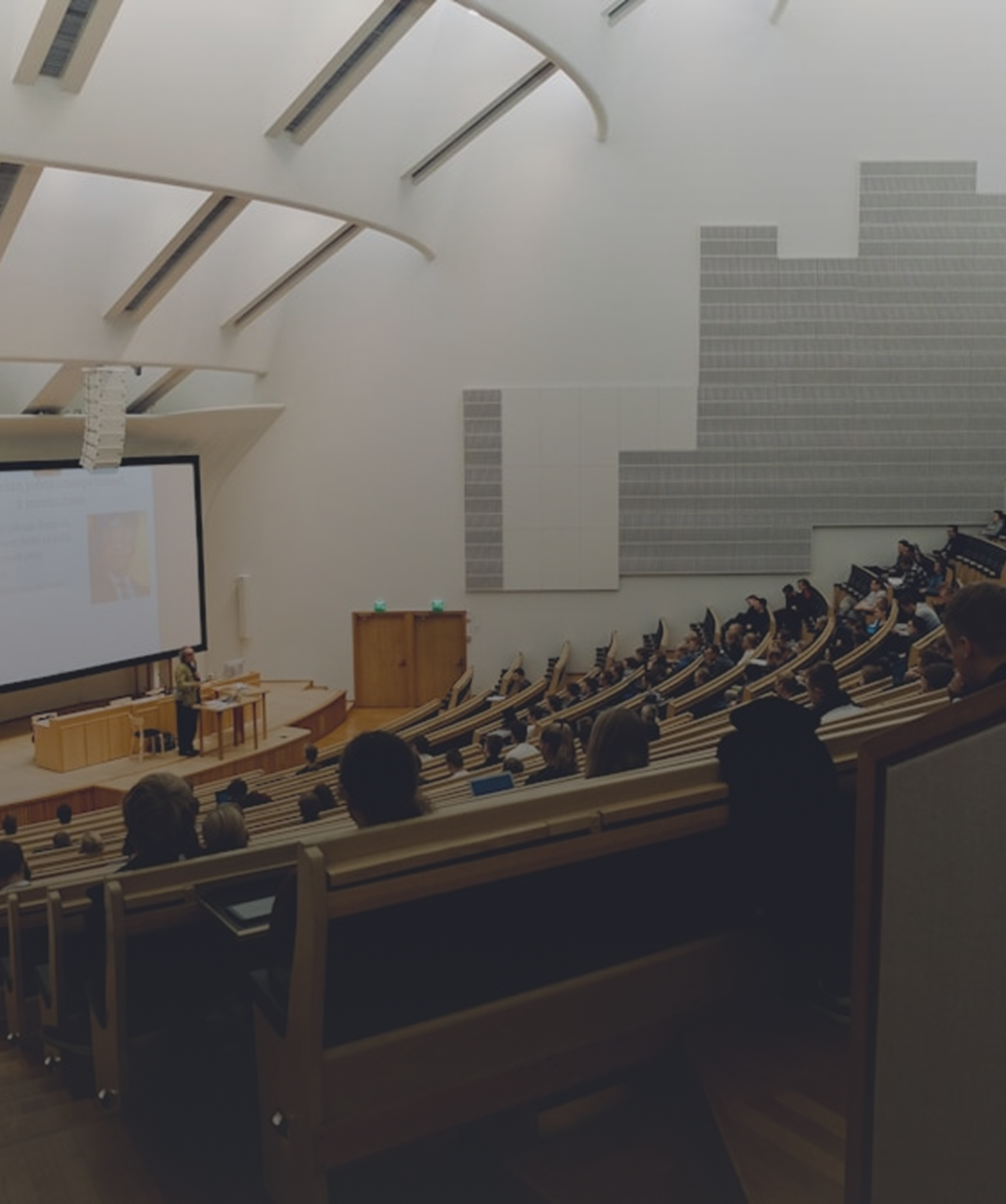 Campus Security for Educational Institutions Students seated in a university lecture hall representing education campus security