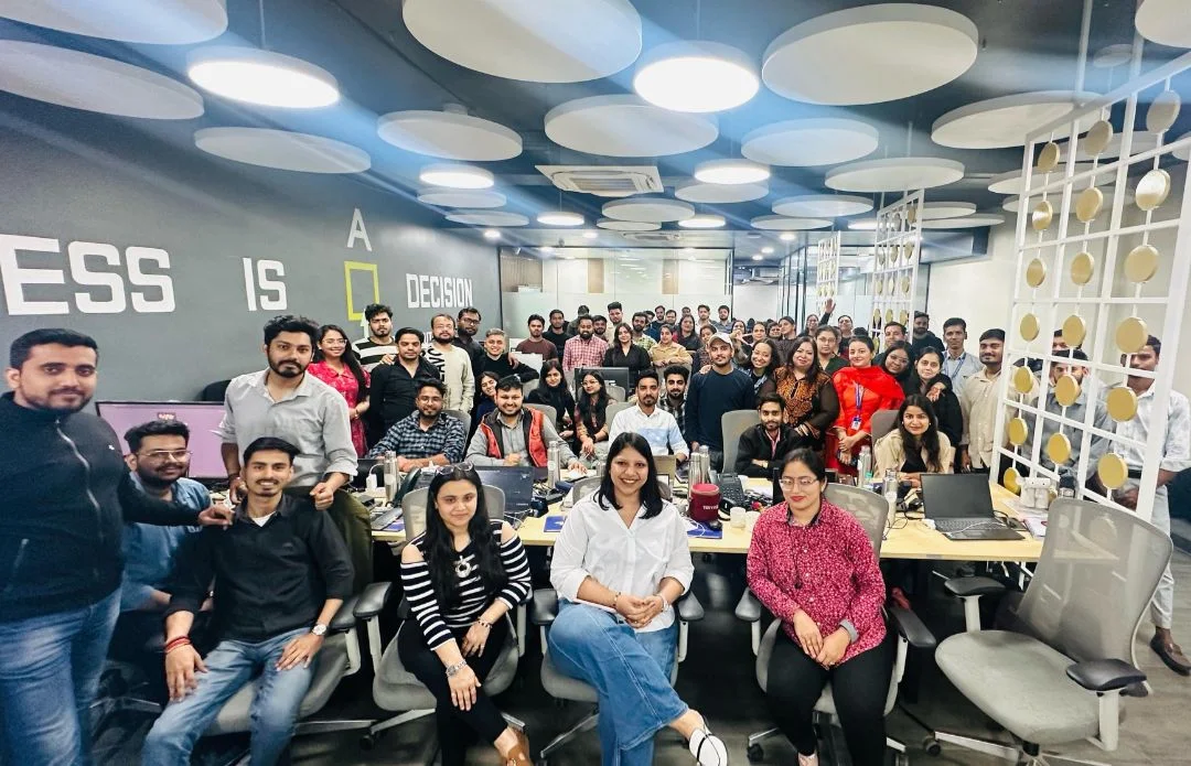 The People Behind Everything We Do Transline Technologies employees posing together for a group photo in the office